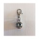 Charms metallo con punto luce bianco.MIS.1CM